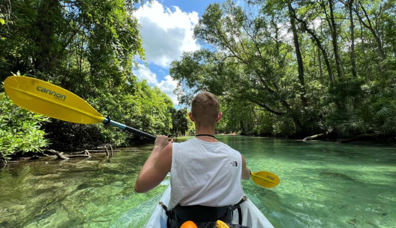 Person swimming in kayak in Weeki Wachee Springs