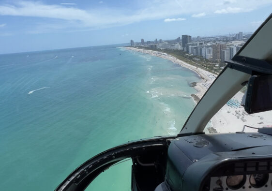 Flying over Miami with a helicopter